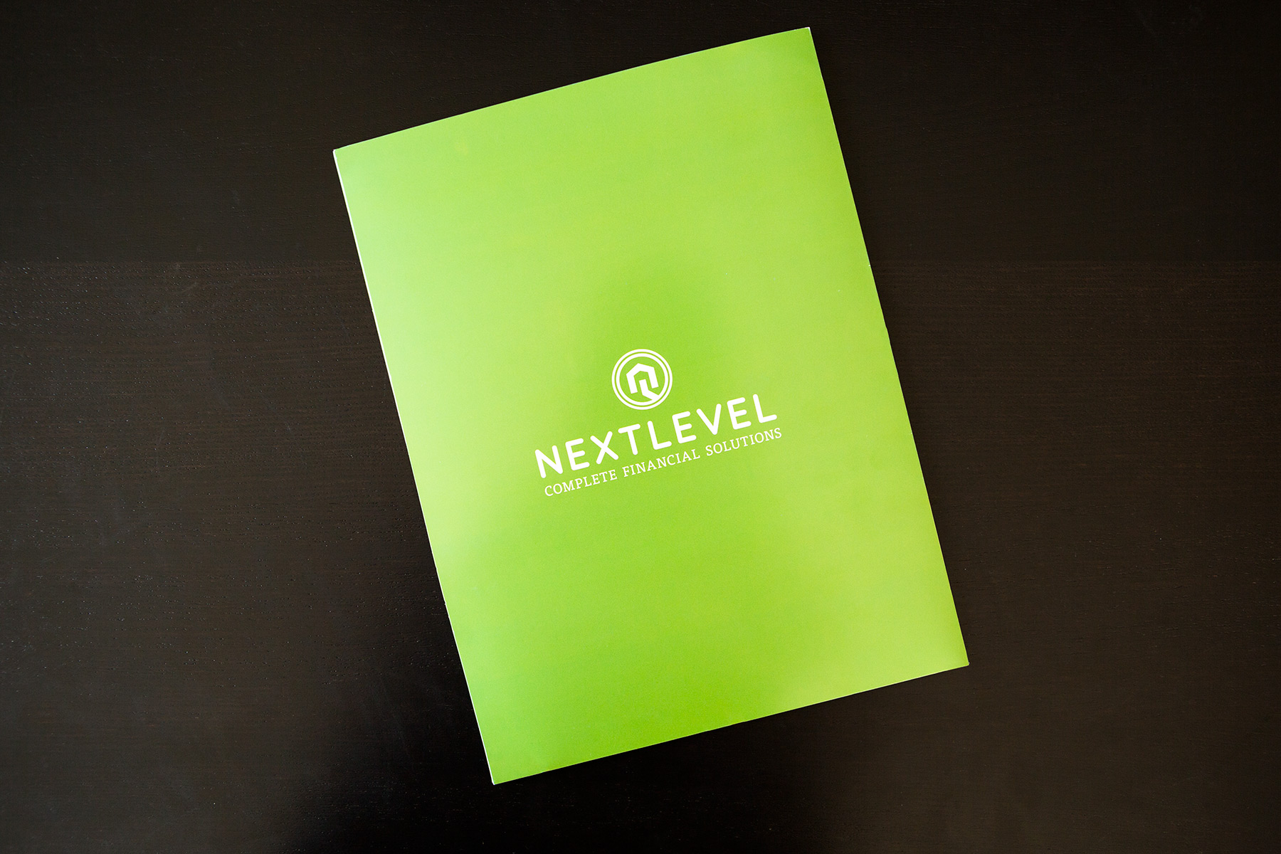 NextLevel Financial logo and stationery